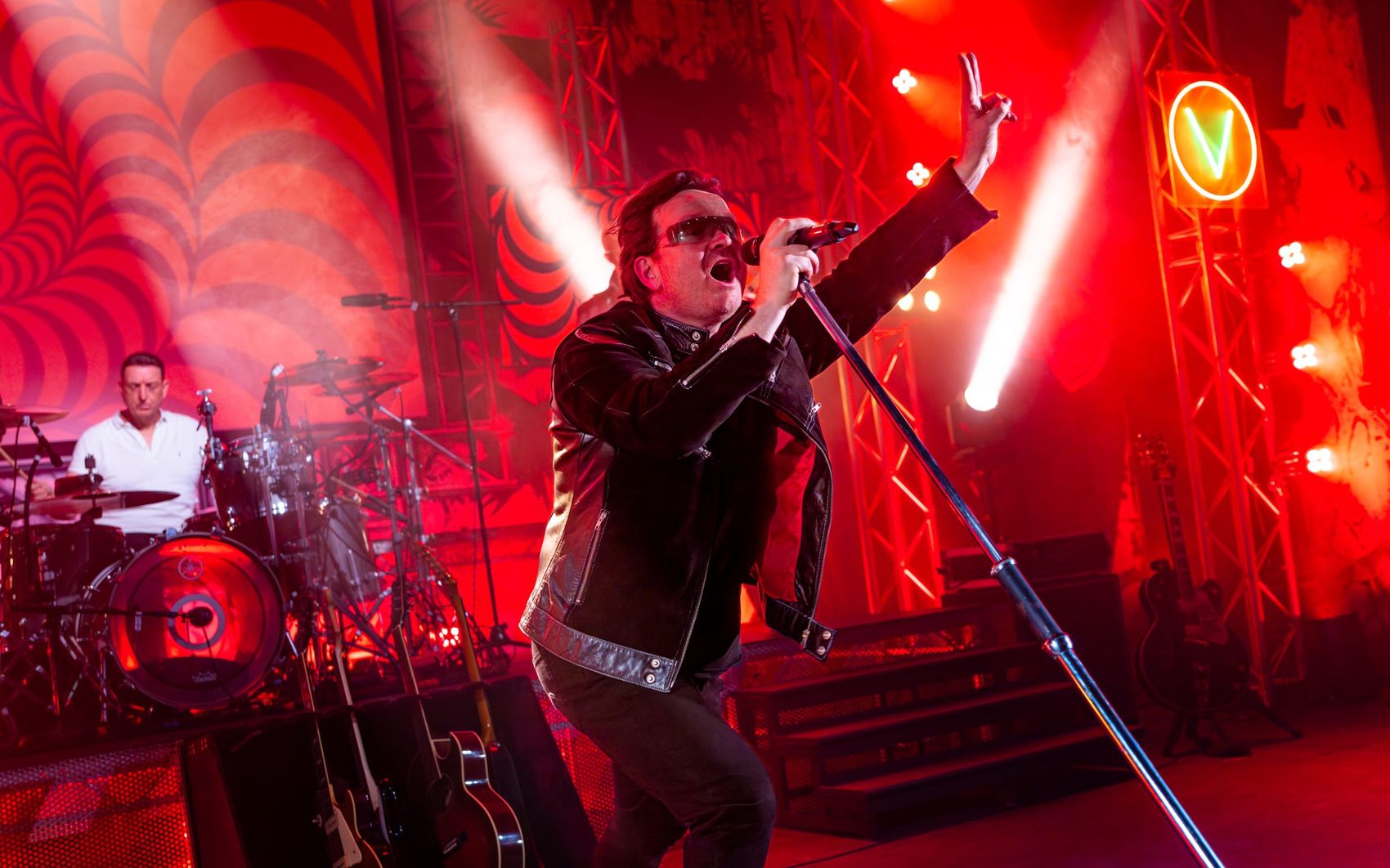 Beautiful Day — One Night of U2, singer in red light